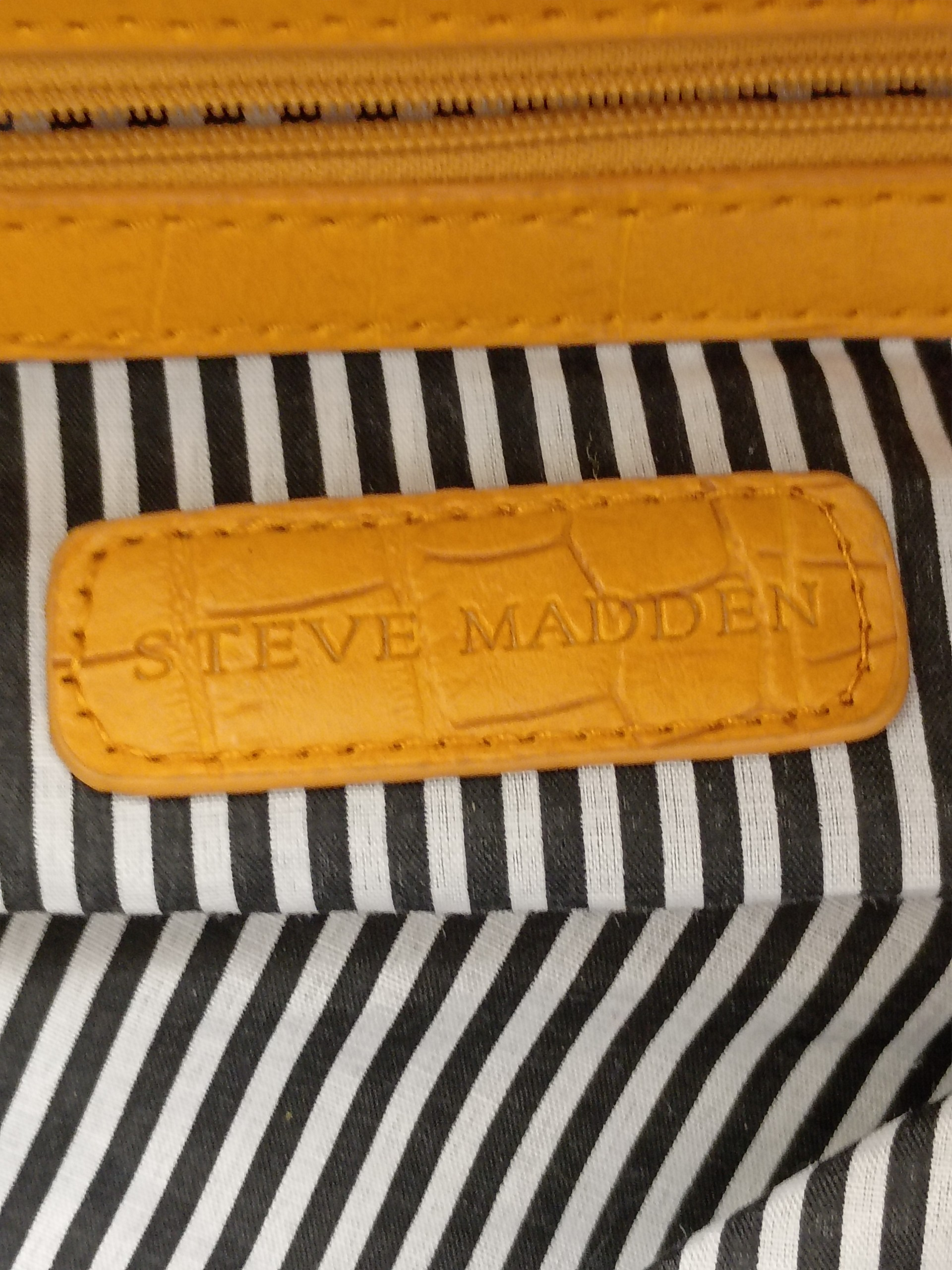 STEVE MADDEN VINTAGE DUFFEL BAG WITH SNAKESKIN PRINT AND YELLOW ACCENTS